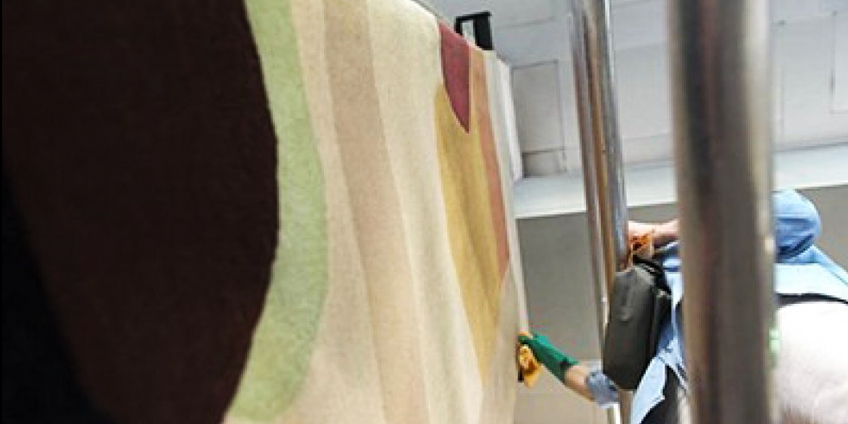 Restauro dell'arazzo di Alberto Burri